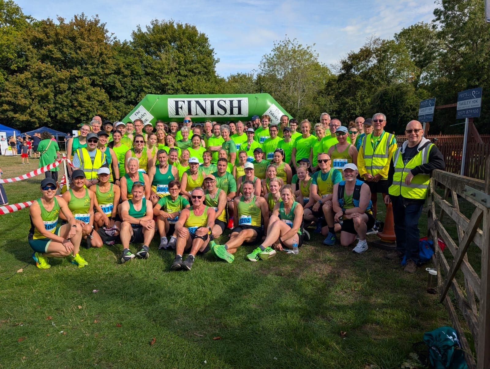 BSRC runners in green and gold at the Takeley 10K finish, 2026