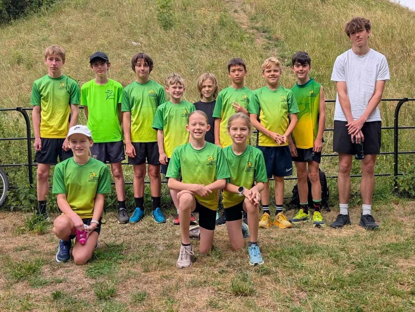 Junior members in club colours at a race